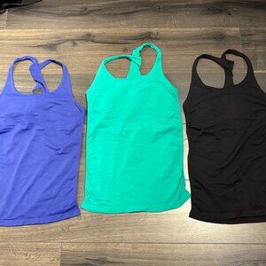 3 Bebe Racerback Scoop Neck Twist Back Tank M/L - Purple, Green, and Black